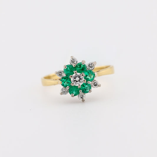 unique engagement clustered emerald and diamond ring at spokane jeweler