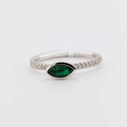 marquis emerald ring in white gold with diamonds